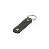 Green full-grain leather keyring, flat lay, angled view — personalised gift — CarveOn, made in Ireland