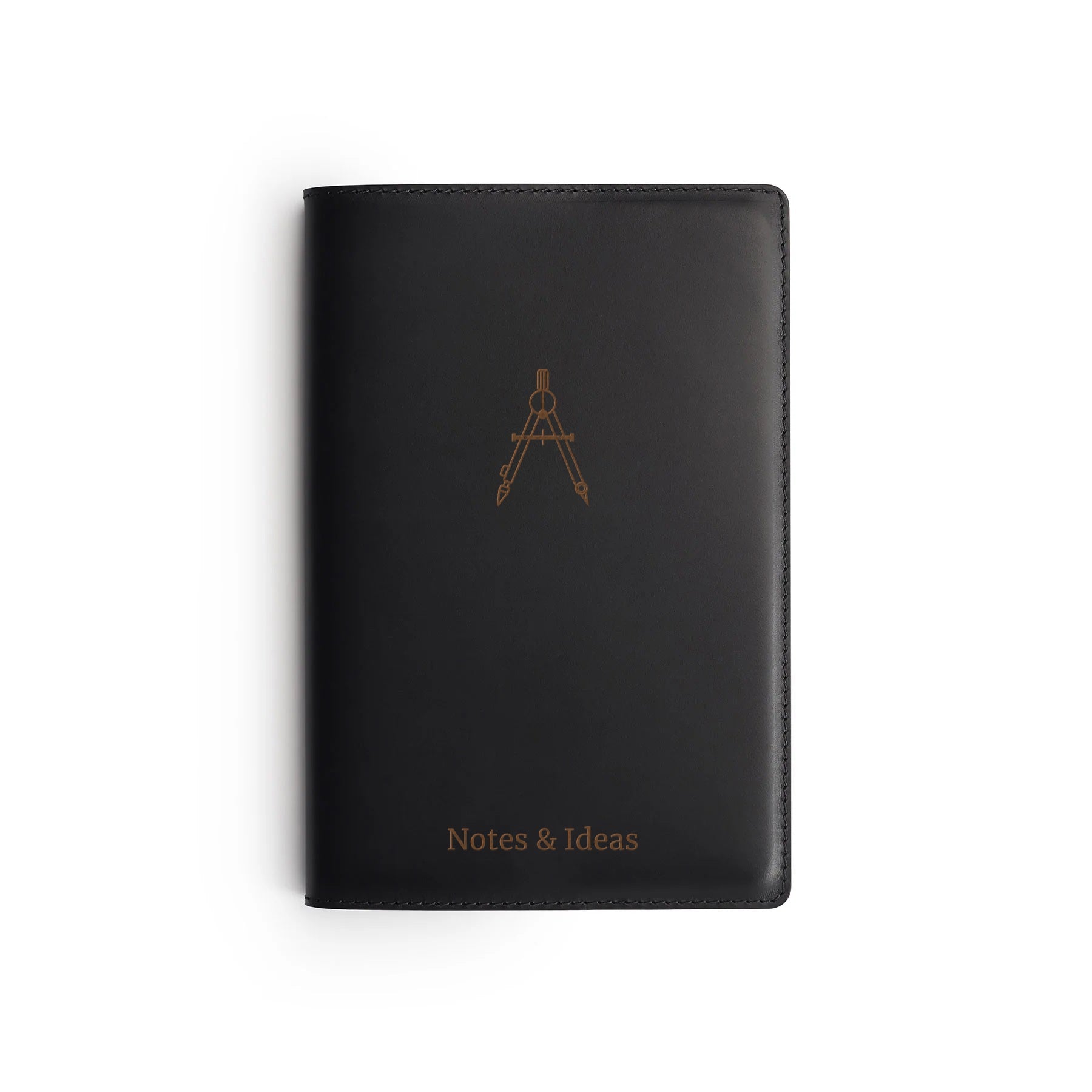 Black full-grain leather A5 notebook, flat lay, engraved with a drawing compass — personalised — CarveOn, made in Ireland#Color_Black