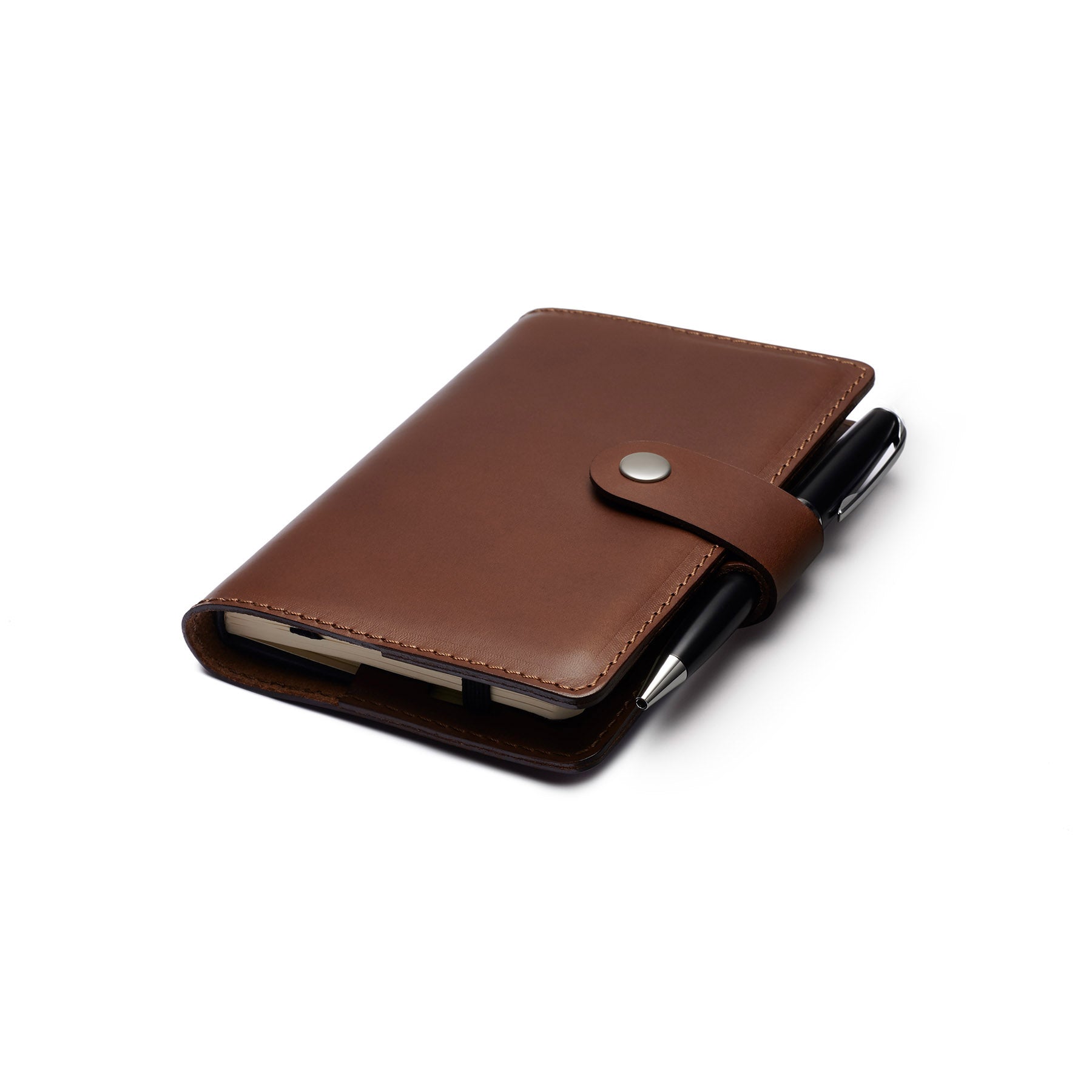 Dark Brown full-grain leather A6 notebook and pen set, flat lay, angled view — personalised with debossed initials — Carve...#Color_Dark Brown