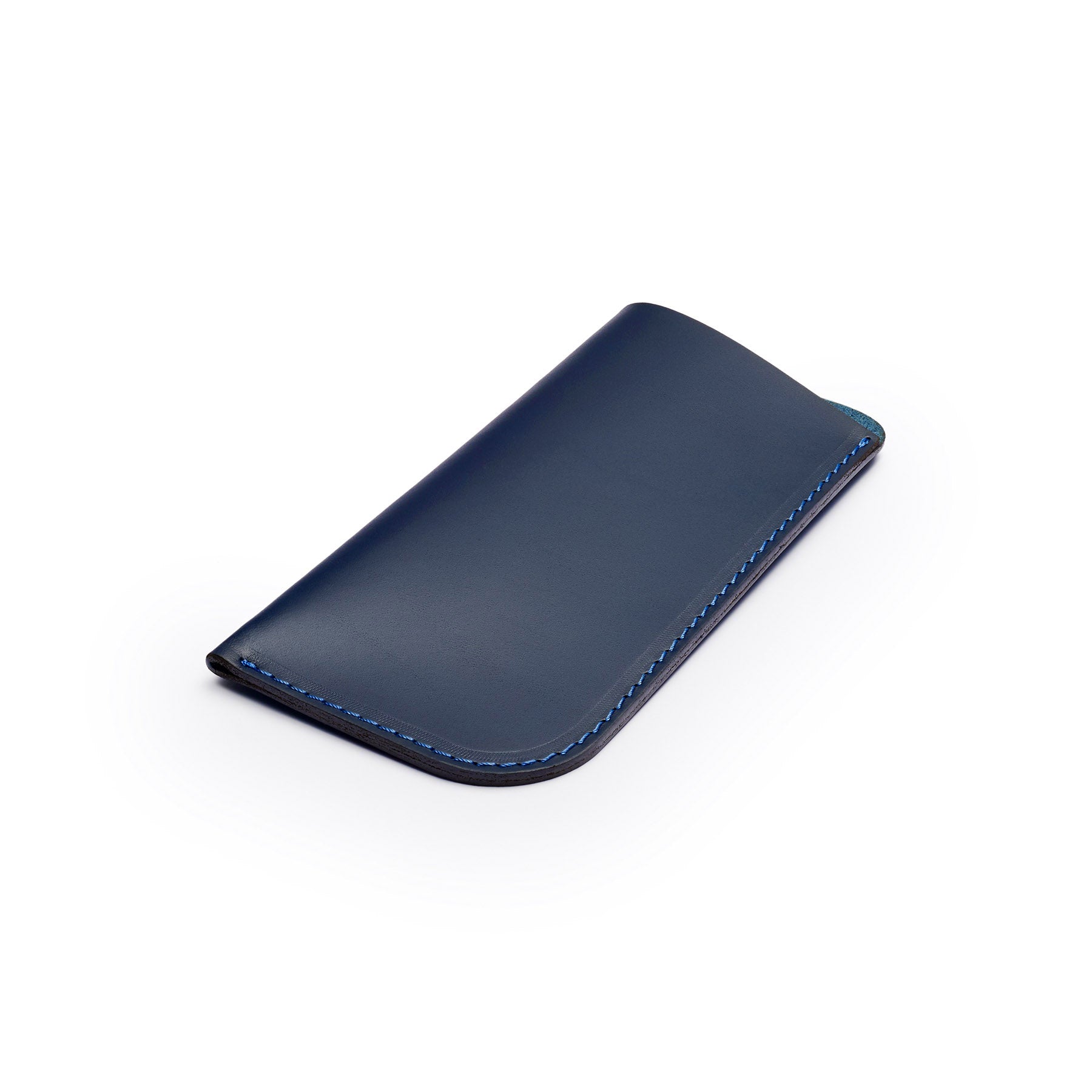 Navy full-grain leather glasses case, flat lay, angled view — personalised — CarveOn, made in Ireland#Color_Navy
