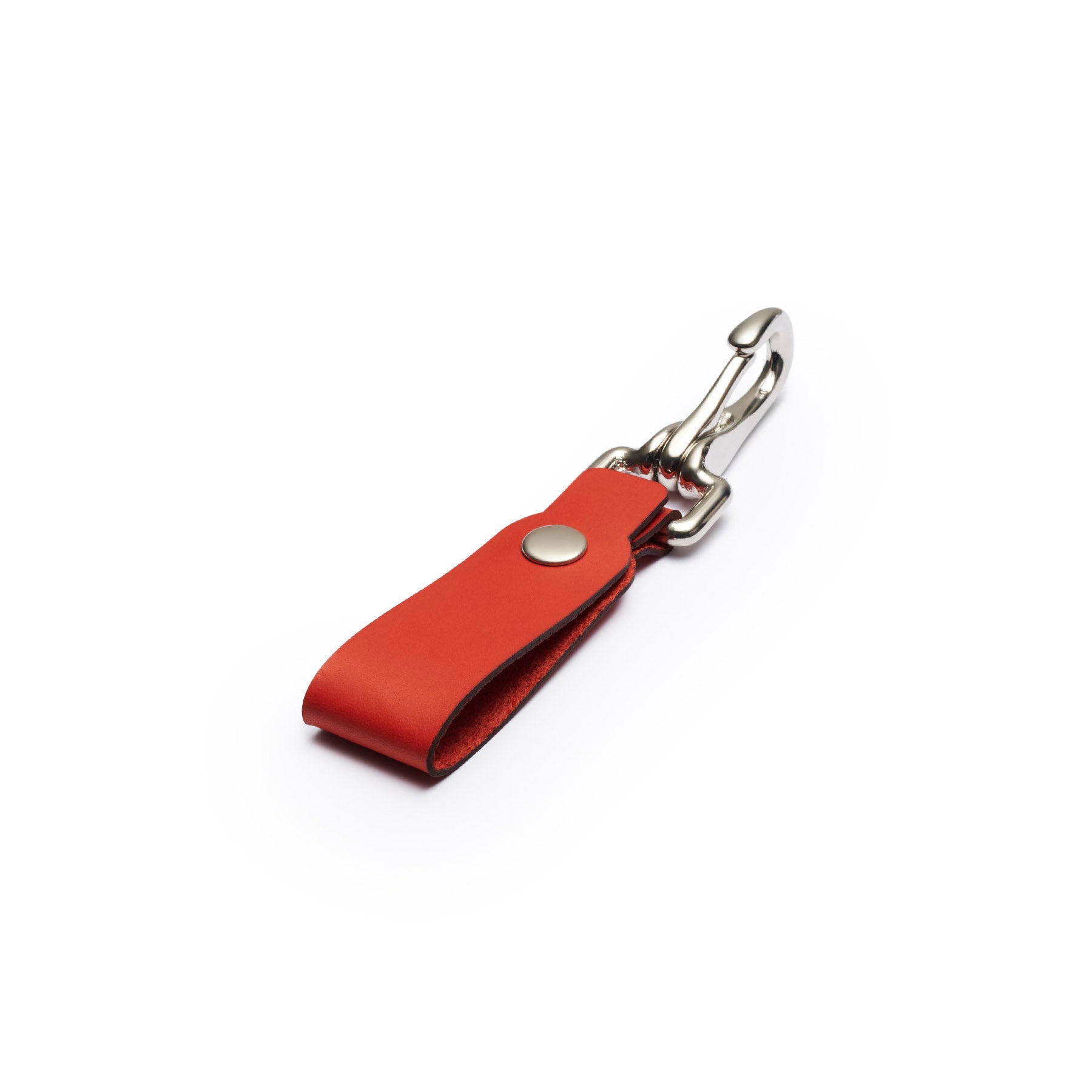 Red full-grain leather keyring, flat lay, angled view — personalised gift — CarveOn, made in Ireland#Color_Red