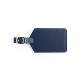 Navy full-grain leather luggage tag, flat lay — personalised travel accessory — CarveOn, made in Ireland