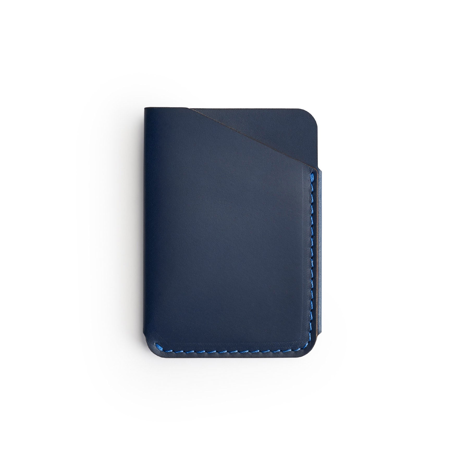Navy full-grain leather quick-draw wallet, flat lay, angled view — personalised — CarveOn, made in Ireland#Color_Navy