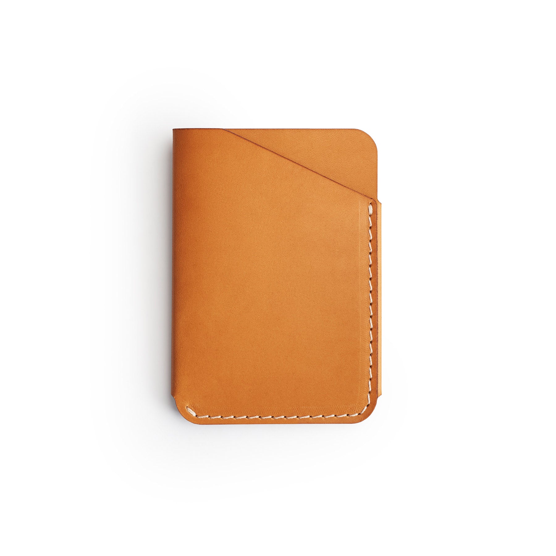Tan full-grain leather quick-draw wallet, flat lay, angled view — personalised — CarveOn, made in Ireland#Color_Tan