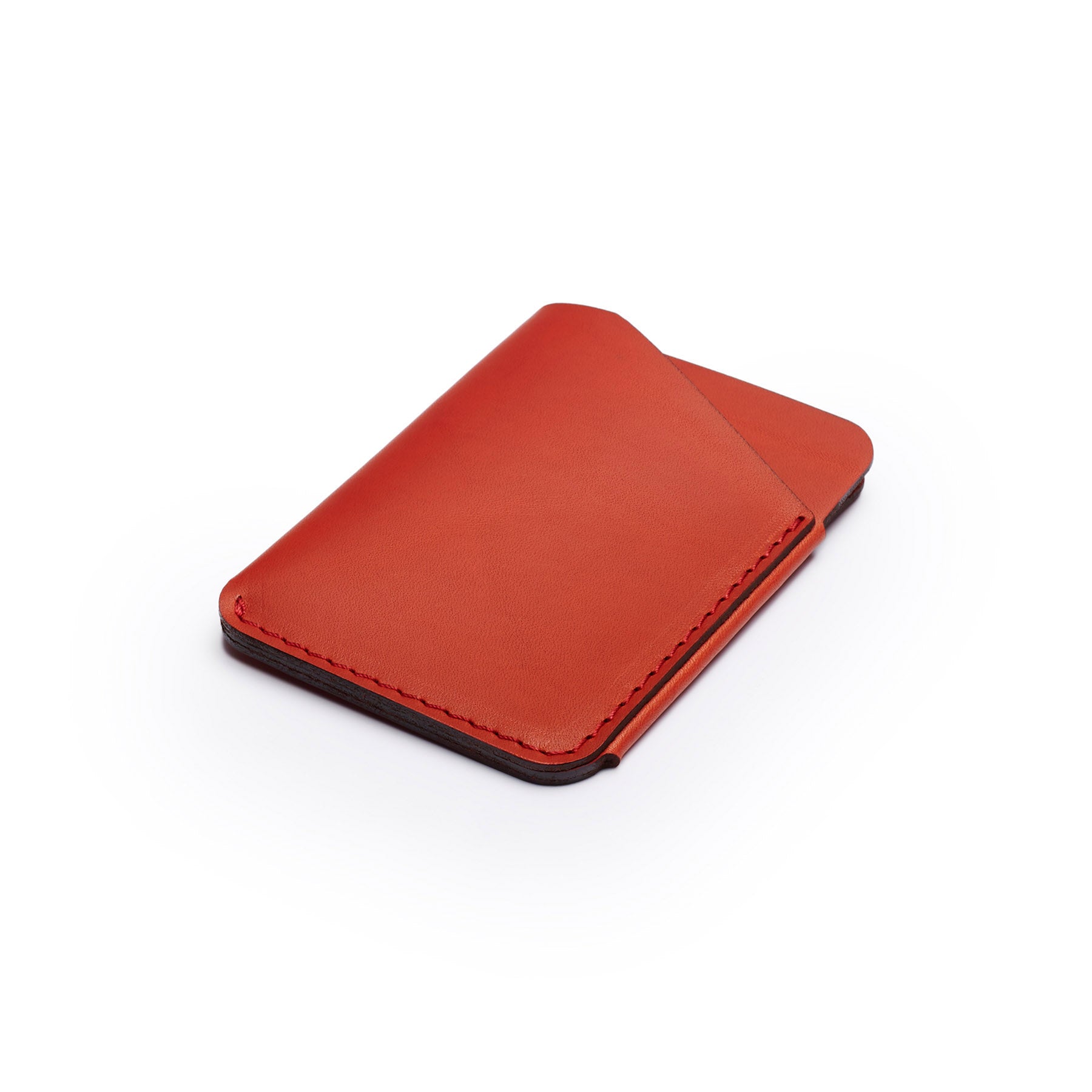 Red full-grain leather quick-draw wallet, flat lay, angled view — personalised — CarveOn, made in Ireland#Color_Red