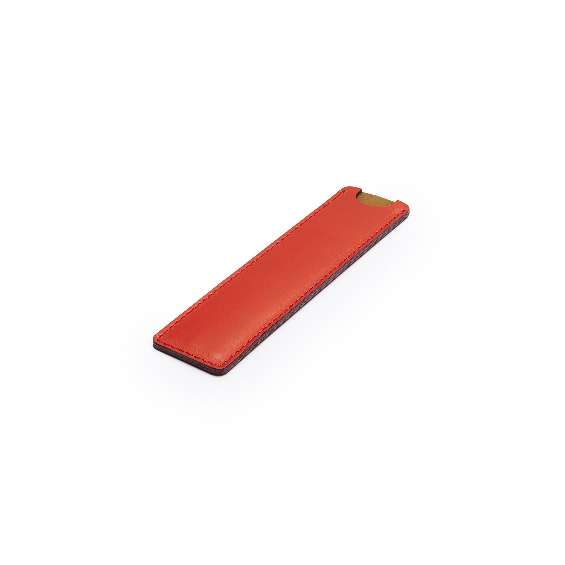 Red solid brass ruler with leather sheath, flat lay, angled view — desk gift — CarveOn, made in Ireland#Color_Red