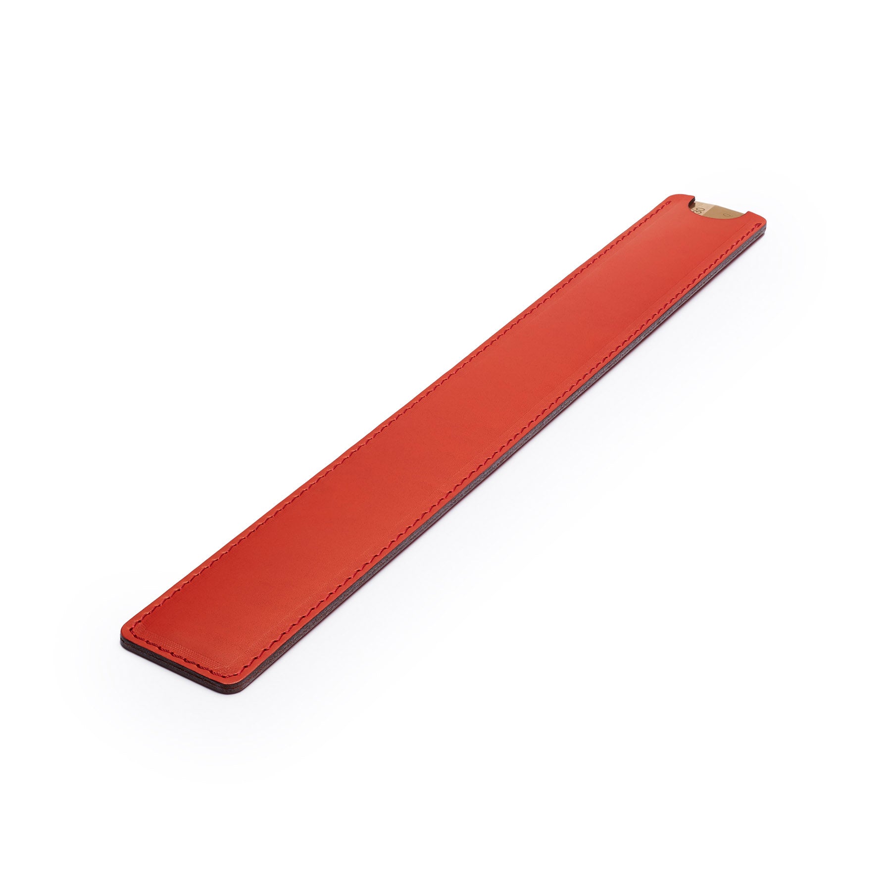 Red solid brass ruler with leather sheath, flat lay, angled view — desk gift — CarveOn, made in Ireland#Color_Red