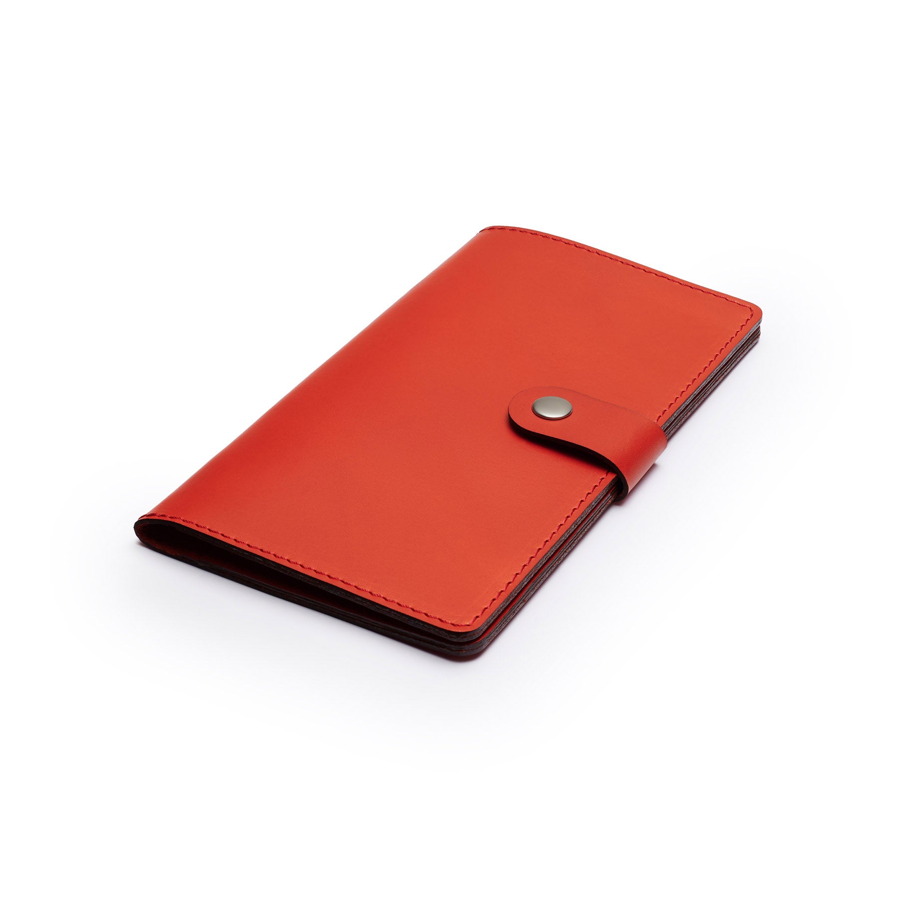 Red full-grain leather travel wallet, flat lay, angled view — personalised — CarveOn, made in Ireland#Color_Red