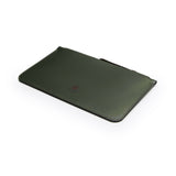 Green full-grain leather zip pouch, flat lay, angled view — personalised — CarveOn, made in Ireland