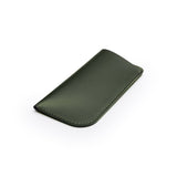 Green full-grain leather glasses case, flat lay, angled view — personalised — CarveOn, made in Ireland