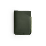 Green full-grain leather quick-draw wallet, flat lay — personalised — CarveOn, made in Ireland