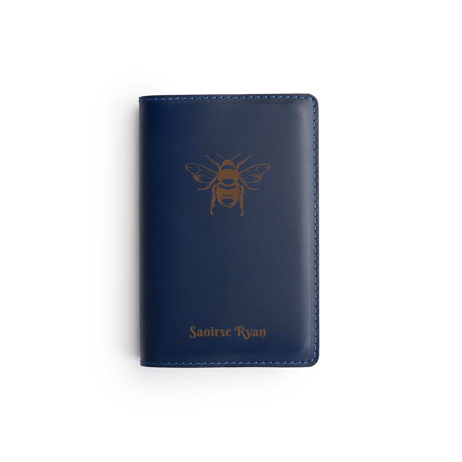Navy full-grain leather A6 notebook, flat lay, engraved with a bee and a name — personalised — CarveOn, made in Ireland#Color_Navy