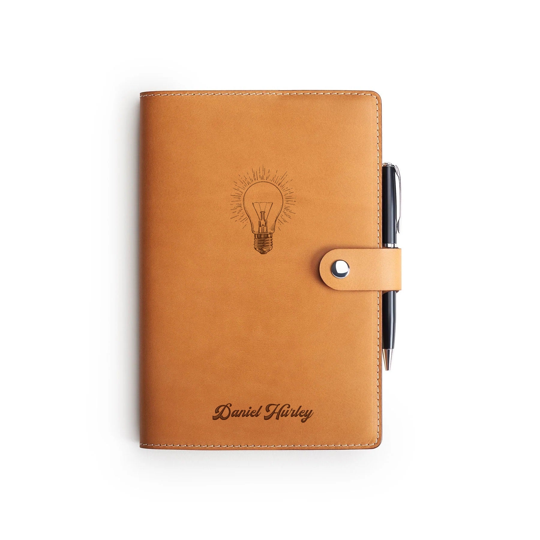 Tan Moleskine notebook with leather cover and pen, flat lay, engraved with a light bulb and a name — personalised gift — CarveOn, made in Ireland#Color_Tan
