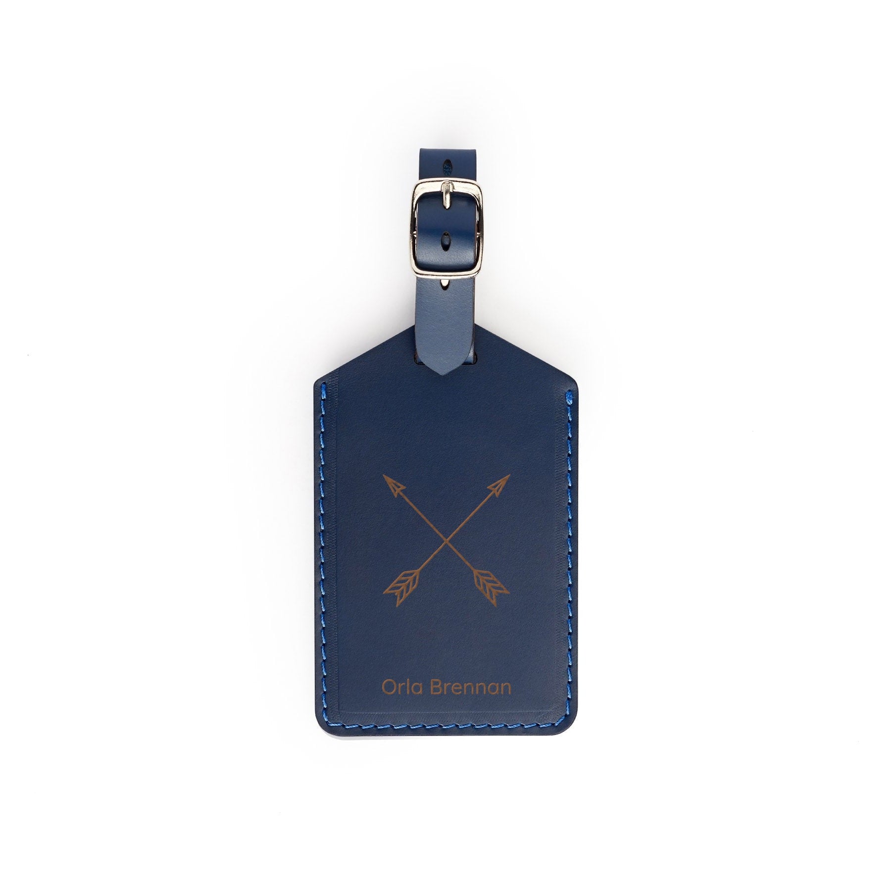 Navy full-grain leather luggage tag, flat lay, engraved with arrows and a name — personalised travel accessory — CarveOn, made in Ireland#Color_Navy