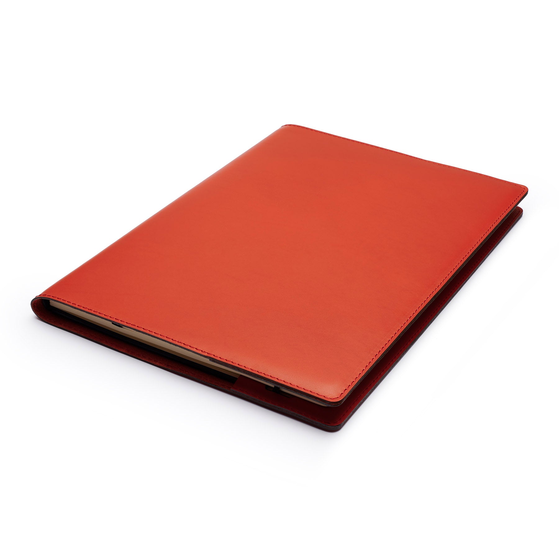 Red full-grain leather A4 notebook, flat lay, angled view — personalised — CarveOn, made in Ireland#Color_Red