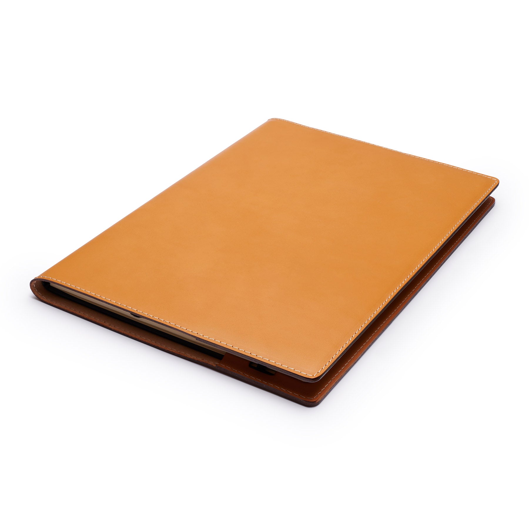 Tan full-grain leather A4 notebook, flat lay, angled view — personalised — CarveOn, made in Ireland#Color_Tan