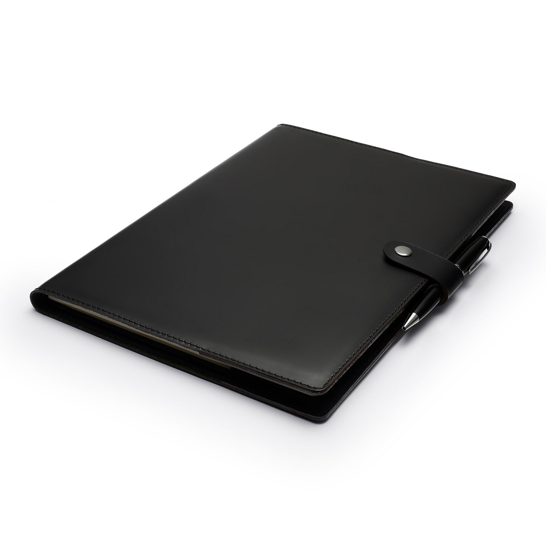 Black full-grain leather A4 notebook and pen set, flat lay, angled view — personalised with debossed initials — CarveOn, m...#Color_Black