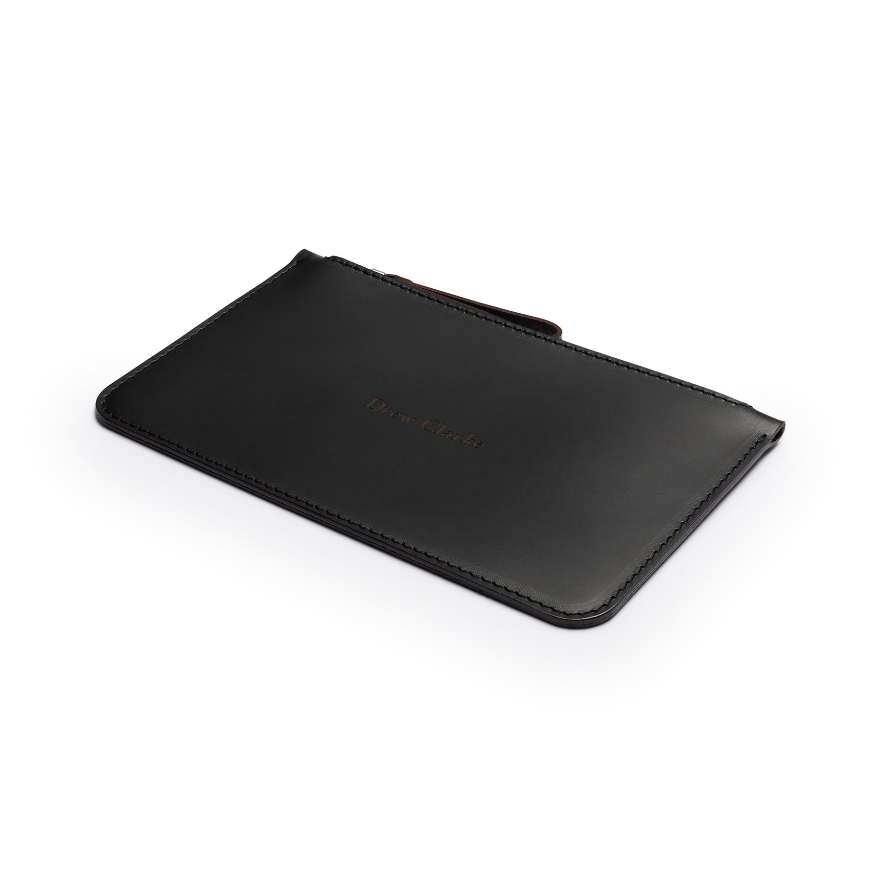 Black full-grain leather zip pouch, flat lay, angled view — personalised — CarveOn, made in Ireland#Color_Black