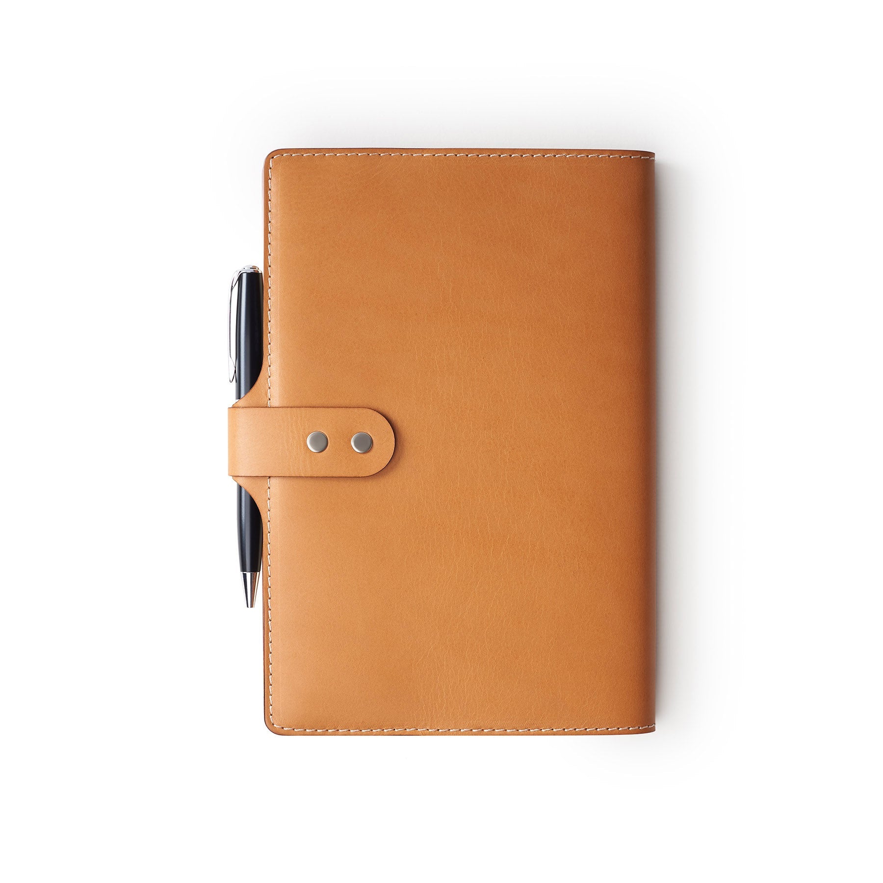 Tan Moleskine notebook with leather cover and pen, flat lay, angled view — personalised gift — CarveOn, made in Ireland#Color_Tan