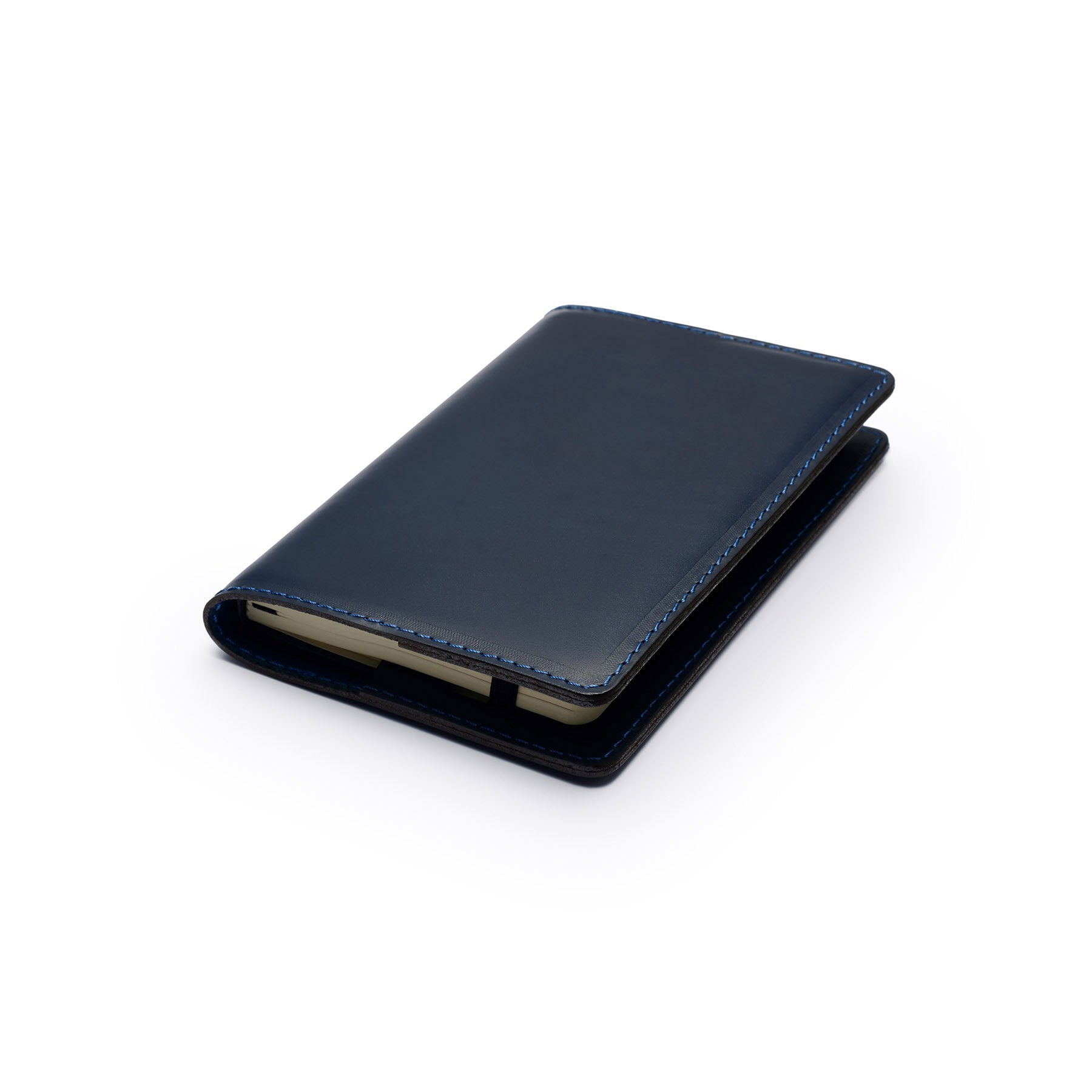Navy full-grain leather A6 notebook, flat lay, angled view — personalised — CarveOn, made in Ireland#Color_Navy