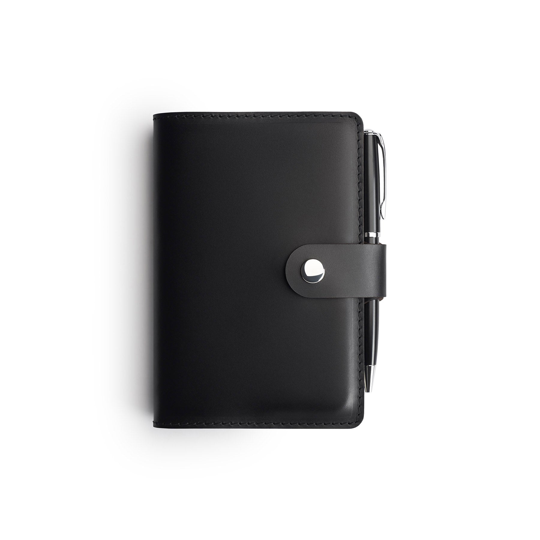 Black full-grain leather A6 notebook and pen set, flat lay — personalised with debossed initials — CarveOn, made in Ireland#Color_Black