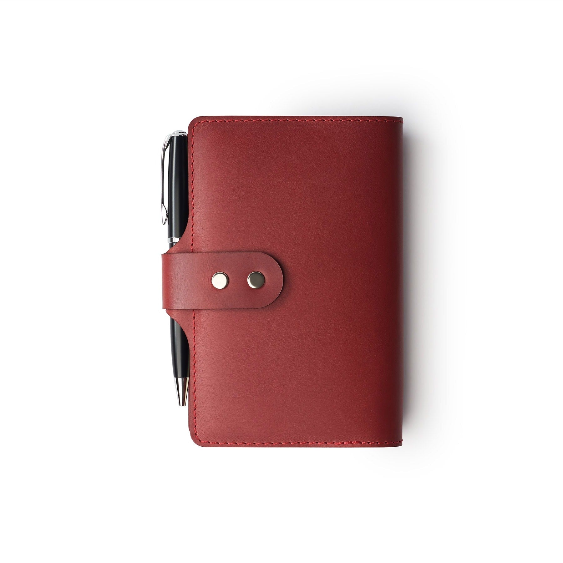 Burgundy full-grain leather A6 notebook and pen set, flat lay — personalised with debossed initials — CarveOn, made in Ire...#Color_Burgundy