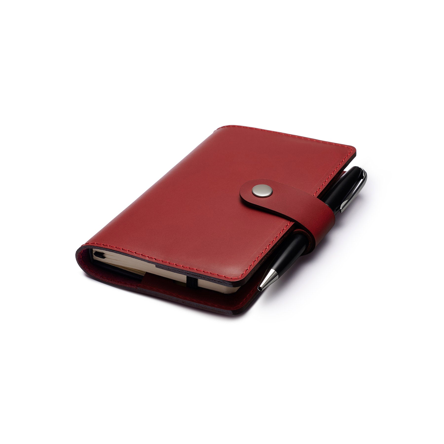 Burgundy full-grain leather A6 notebook and pen set, flat lay, angled view — personalised with debossed initials — CarveOn...#Color_Burgundy