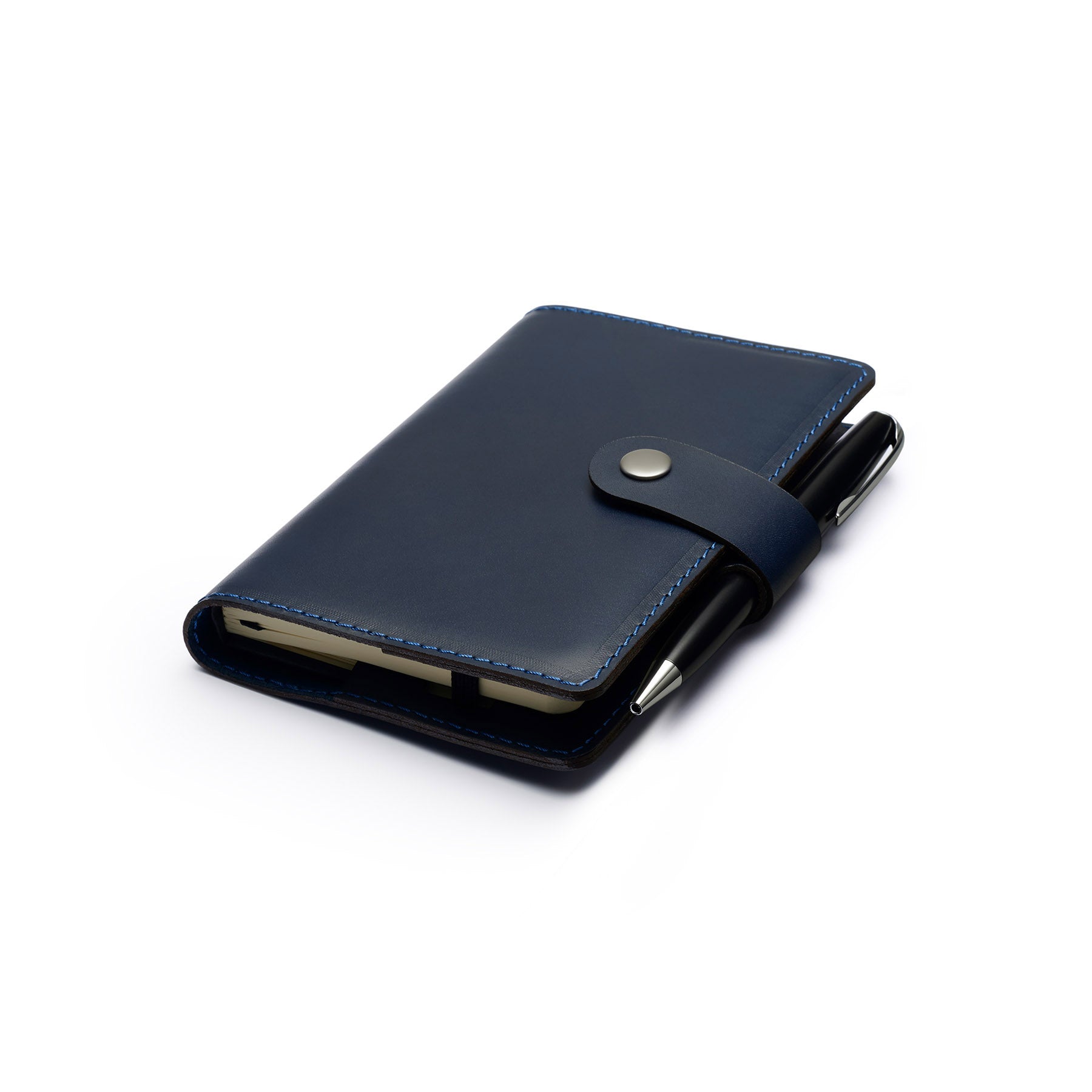 Navy full-grain leather A6 notebook and pen set, flat lay, angled view — personalised with debossed initials — CarveOn, ma...#Color_Navy