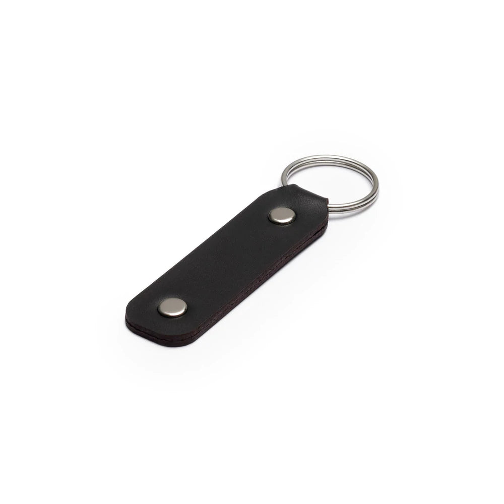 Black full-grain leather keyring, flat lay, angled view — personalised gift — CarveOn, made in Ireland#Color_Black