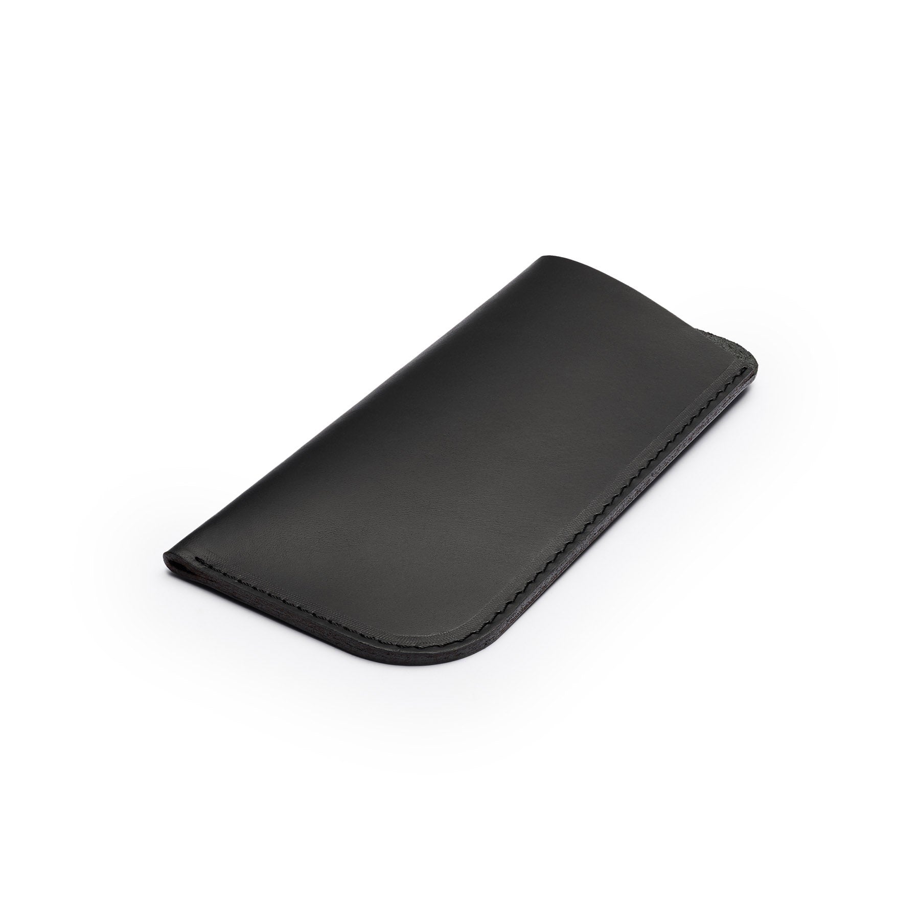 Black full-grain leather glasses case, flat lay, angled view — personalised — CarveOn, made in Ireland#Color_Black
