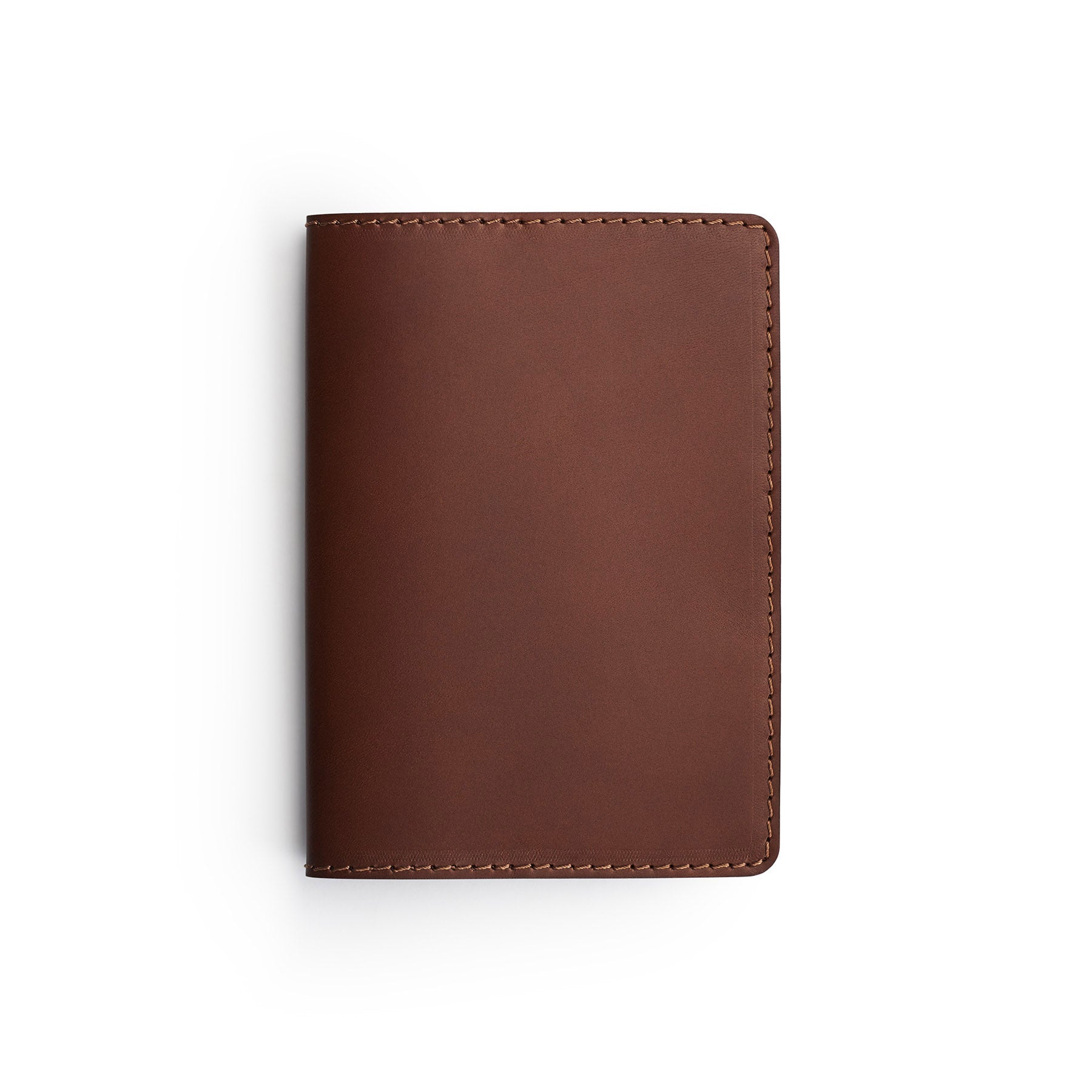 Dark Brown full-grain leather passport holder, flat lay — personalised travel gift — CarveOn, made in Ireland#Color_Dark Brown