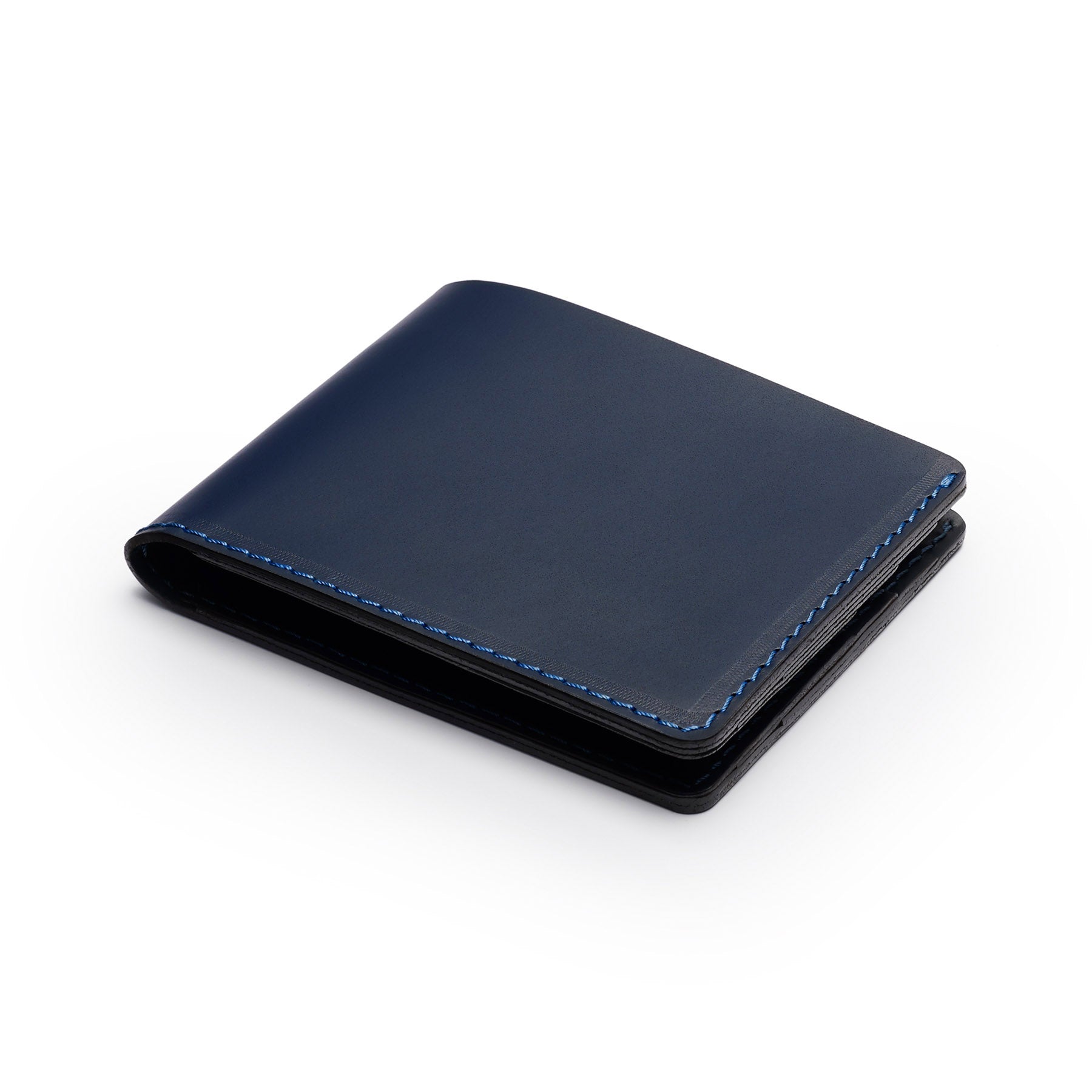 Navy full-grain leather traditional wallet, flat lay, angled view — personalised — CarveOn, made in Ireland#Color_Navy