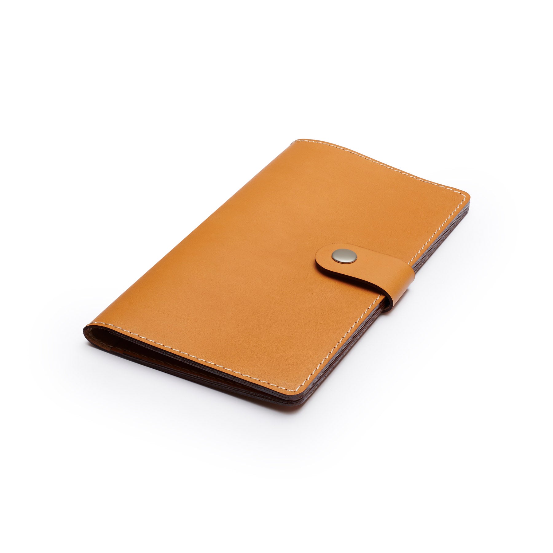 Tan full-grain leather travel wallet, flat lay, angled view — personalised — CarveOn, made in Ireland#Color_Tan