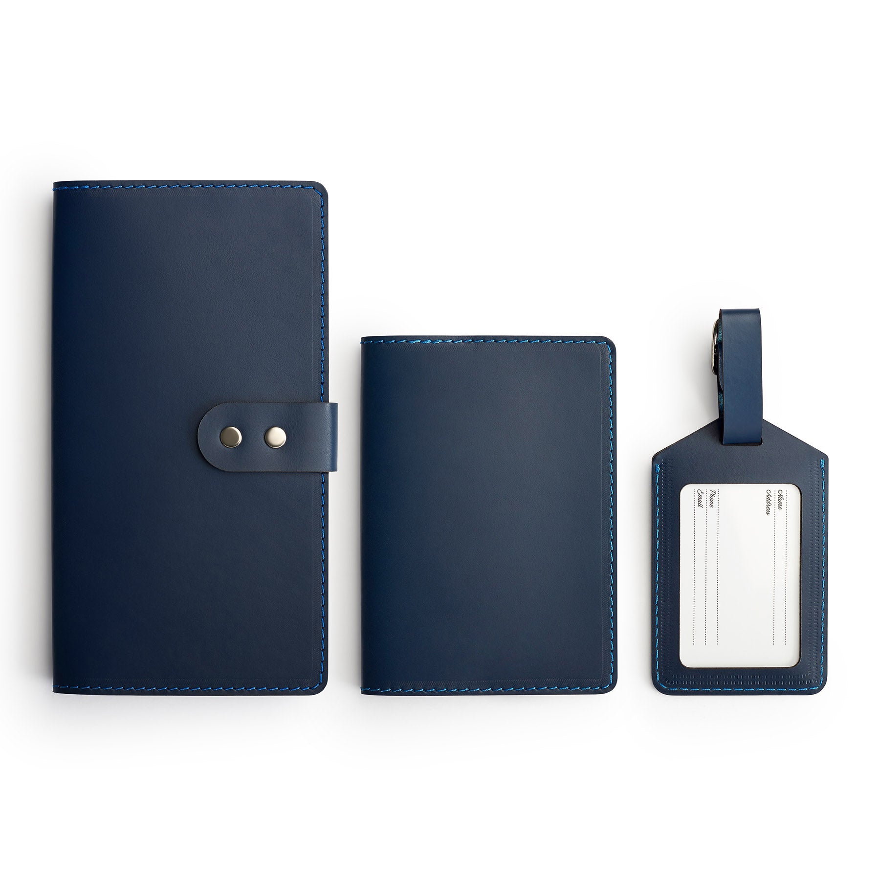 Navy leather travel gift set, flat lay — personalised — CarveOn, made in Ireland#Color_Navy